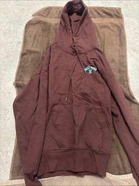 Daily Paper maroon brown hoodie with teal chest logo